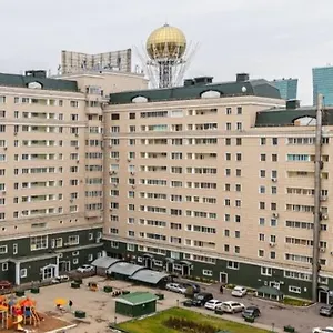 Апартаменты 25 вид на байтерек для 1-4 человек с кроватью и раскладным диваном, Астана